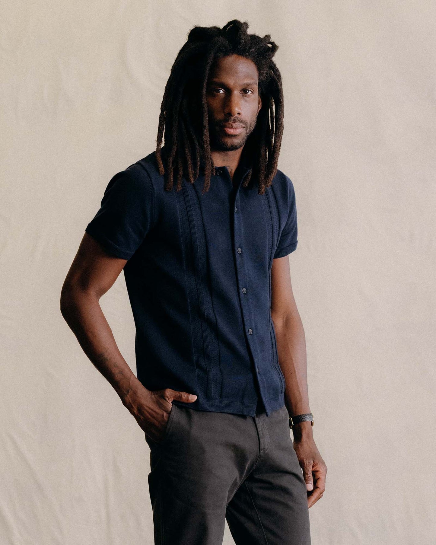 The Button Down Polo in Dark Navy Stripe