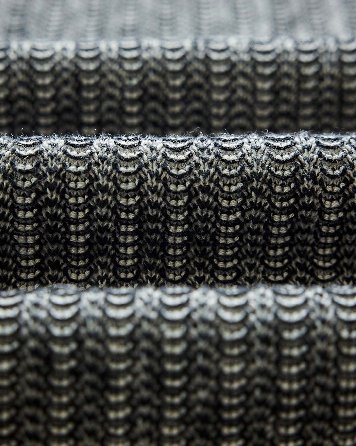 The Valencia Sweater Polo in Coal Scallop