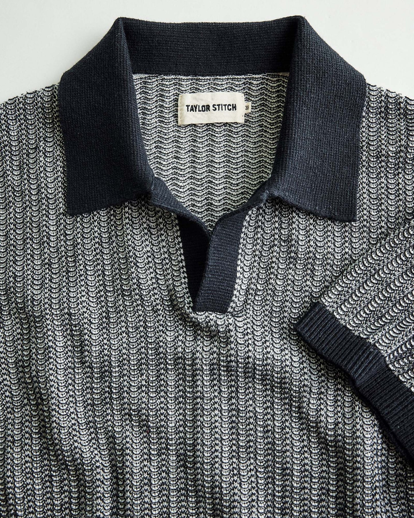 The Valencia Sweater Polo in Coal Scallop