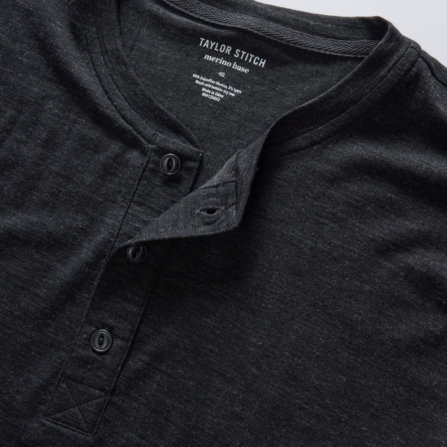 The Merino Henley in Heather Black
